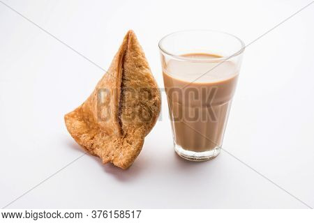 Samosa snack Is An Indian Deep Fried Pastry With A Spiced Filling Usually Made With Potatoes, Spices