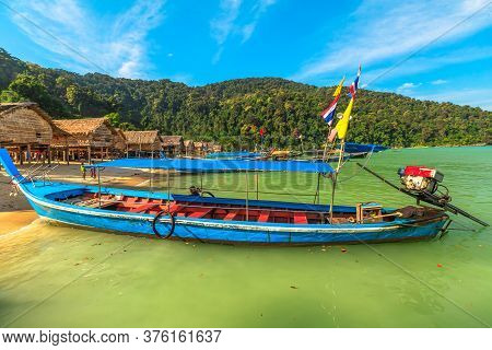 Surin Islands, Phang-nga, Thailand - January 3, 2016: Diesel Traditional Thai Long-tail Boat In Moke