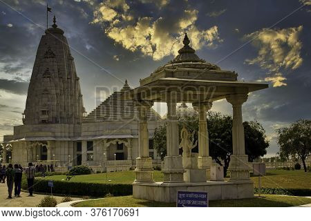 Jaipur, India - October 21, 2012: Wide Angle Shot Of Iskon Krishna Hindu Temple Against Dramatic Sun
