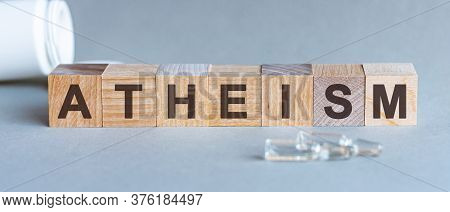 The Word Of Atheism On Building Blocks, Medicine Concept