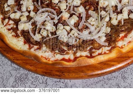 Dried Meat Pizza With Onion And Heart Of Palm Typical Of Brazil Where It Is Called Pizza De Carne Se