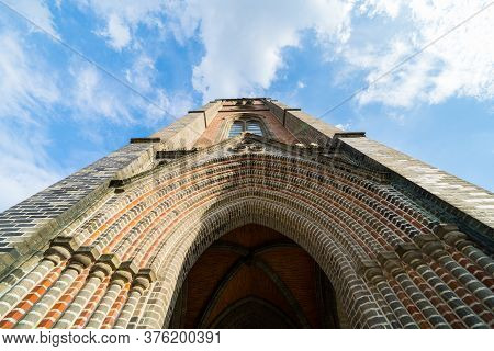 Seoul,south Korea-september 2019: Low Angle Shot Of Myeongdong Cathedral With A Cloudy Blue Sky. His