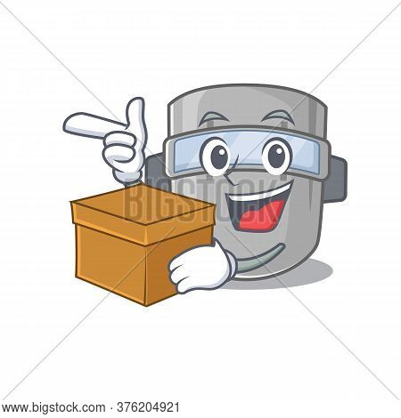 A Cheerful Welding Mask Cartoon Design Concept Having A Box