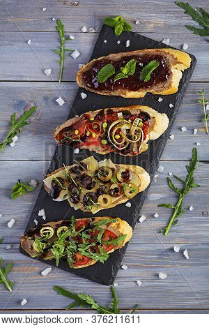 Bruschetta With Chicken Liver Paste. Delicious Bruschettas With Various Fillings. Different Bruschet