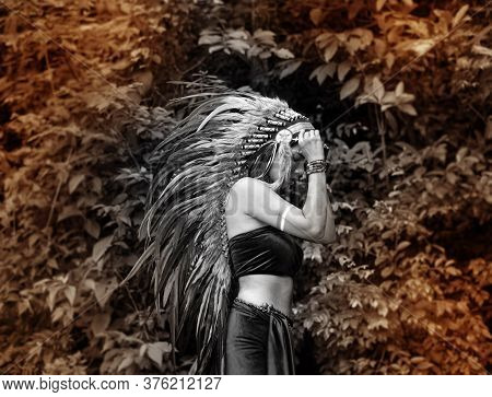 The Abstract Art Design Background Of Beautiful Woman Wearing Black Dress And Put Headdress Made Fro