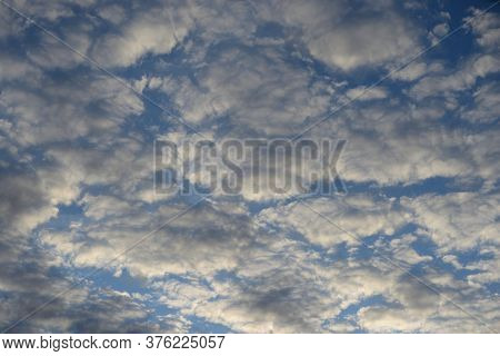 Altocumulus Clouds At Sunset, Can Be Used As Background.