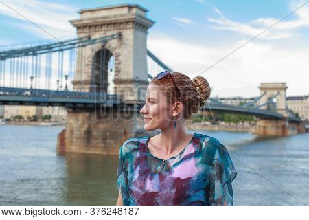 Young Woman Posing At Chain Bridge, Lanchid, Budapest, Hungary