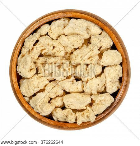 Soya Chunks In Wooden Bowl. Textured Soy Protein, Also Known As Soy Meat. Defatted Soy Flour Product
