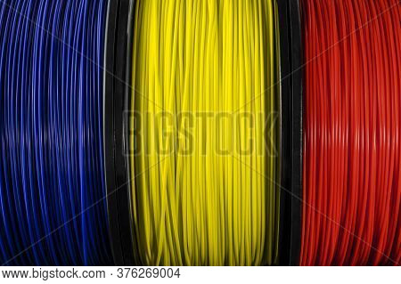Romania Flag Of The Coils For 3d Printer. Filament For 3d Printing. Bright Thermoplastic Of Blue, Ye