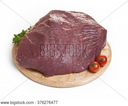 raw beef fillet on the cutting board isolated on the white background.