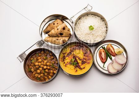 Indian Veg Lunchbox For Office Of Workplace With Chole, Dal Fry Rice And Chapati