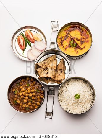 Indian Veg Lunchbox For Office Of Workplace With Chole, Dal Fry Rice And Chapati