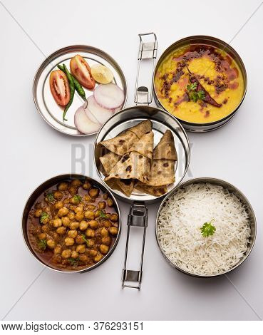Indian Veg Lunchbox For Office Of Workplace With Chole, Dal Fry Rice And Chapati