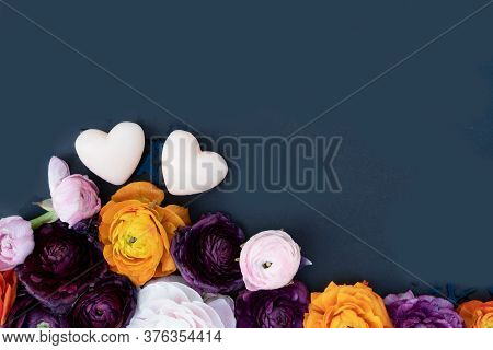 Buds Of Valentines Day Festive Flowers With Two Hearts On Minimal Black Background