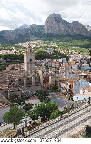 Village Of Polop De Marina With Church And Rocky Mountainrange, Costa Blanca, Spain