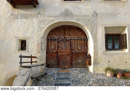 Guarda, Switzerland - Aug 14, 2009: Facade Of An Old House With Fresco Decorations In The Ancient Vi