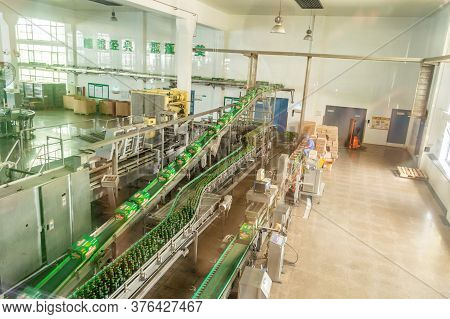 Qingdao / China - August 6, 2015: Tsingtao Beer Production Line In Tsingtao Beer Brewery In Qingdao,