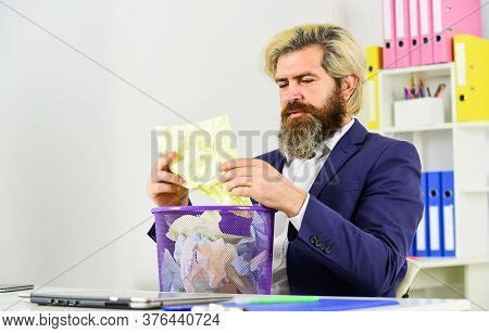 Office Spy. Digging In The Trash. Rummaging Through The Papers. Businessman Hold Trash Can. Man Look