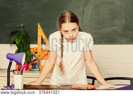 Hooked On Learning. Hometask Concept. Small Kid Study School. Girl Cute Child Sit School Classroom C