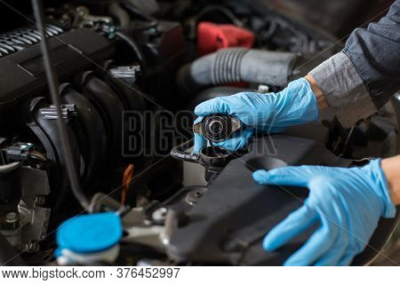 Checking The Engine, Mechanic Checking Car Radiator, Close-up.