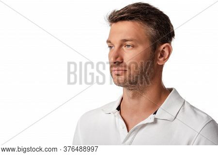 Handsome Man In White T-shirt Looking Away Isolated On White