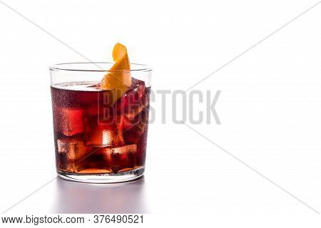 Boulevardier Cocktail And Orange Zest In Glass Isolated On White Background. Copy Space