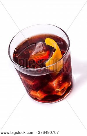 Boulevardier Cocktail And Orange Zest In Glass Isolated On White Background