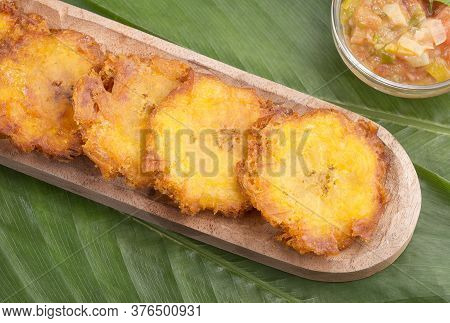 Patacón Fried Flattened Pieces Of Green Plantain (tostón, Tachino)