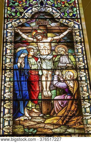 San Antonio, Texas - October 8, 2019 Basilica Jesus Christ Virgin Mary Crucifixion Stained Glass Sai