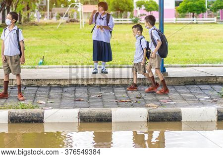 Kanchanaburi,thailand-july 2,2020:thai Students Wear Various Medical Masks To Prevent Themselves Fro