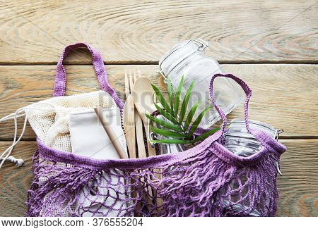 Cotton Bags, Net Bag With Reusable  Glass Jars, Bamboo And Wooden Cutlery. Zero Waste Concept. Eco F