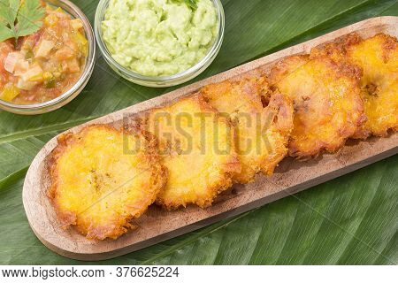 The Patacón, Tostón, Tachino, Fried Or Chopped Is A Meal Based On Flattened Fried Pieces Of Green Pl