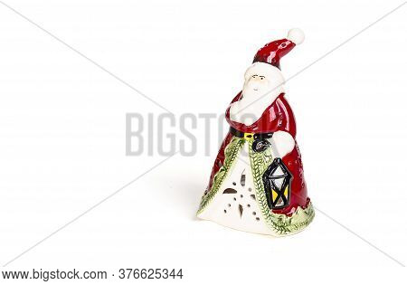 Ceramic Toy Santa On A White Background