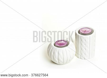 Candles In Candlestick On A White Background