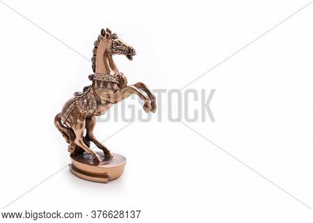 Bronze Horse Figurine On A White Background