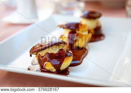 French Profiteroles with chocolate sauce