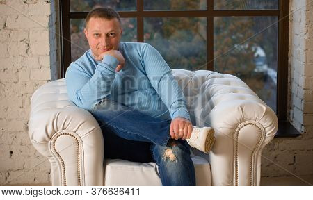 A Man In Casial Style, A Strong And Confident Plump Man In A Suit,  Plus Size Man Concept