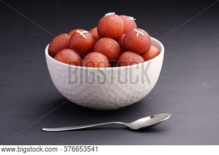 Indian Dessert Gulabjamun Fried Balls Socked In Sugar Syrup