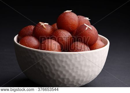 Indian Dessert Gulabjamun Fried Balls Socked In Sugar Syrup