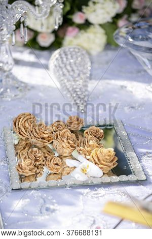 Traditional Decor And Food From A Persian Wedding Ceremony Setting
