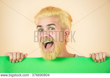 Booklet Design Sheet Display Read First Person. Surprised Happy Bearded Man Holding Empty Green Pape