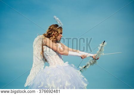 Angel Children Girl With White Wings. Innocent Girl With Angel Wings Standing With Bow And Arrow Aga