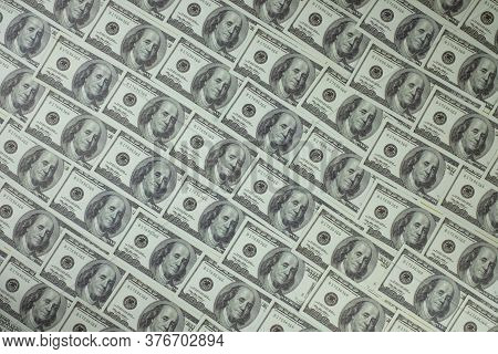 Group Of Money Stack Of 100 Us Dollars Banknotes A Lot Of Is Arranged In A Beautiful