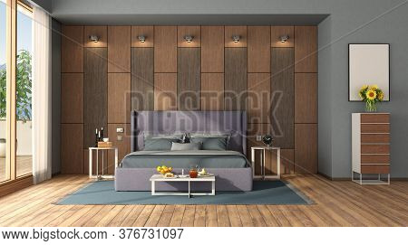 Modern Bedroom With Double Bed Against Wooden Panel , Coffeetable And Drawers- 3d Rendering
