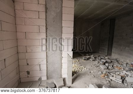 Wall Smashed Into Debris Room In Apartment Ready For Renovation With Destroyed Smashed Wall Demolish