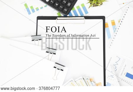 Paper With The Freedom Of Information Act Foia On A Table