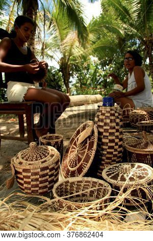 Santa Cruz Cabralia, Bahia / Brazil - January 19, 2009: Person Is Seen Making Handicraft From Piacav