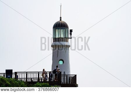 Busan,south Korea - July 20, 2017: Old Lighthouse On The Hill Of Haeundae Dongbaekseom Island On Jul