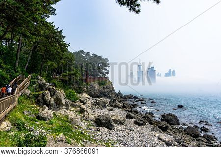 Busan,south Korea - July 20, 2017:  The Wooden Suspension Bridge On The Rock Cilff In Haeundae Dongb