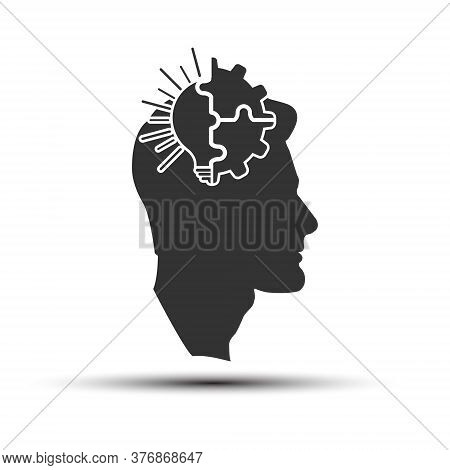 Light Bulb And Gear Combined With The Silhouette Of A Man's Head. A Metaphor For The Realization Of 